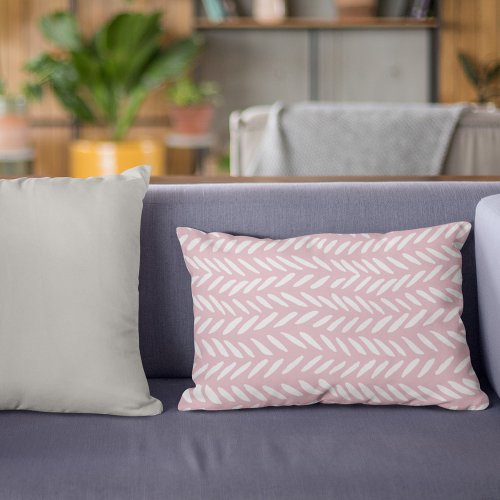 Cute pastel herringbone pattern on pink accent pillow