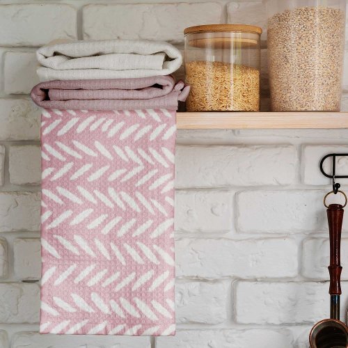 Cute pastel herringbone pattern on pink square kitchen towel