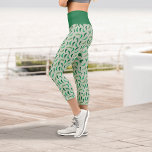 Cute Patterned Chile Peppers on Green Capri Leggings<br><div class="desc">Green chile peppers filled with green and white handdrawn patterns over a pale green background.  Dots in yellow,  dark blue,  white,  and red scattered over the background. Elegant but casual pattern perfect for lots of different items. Also comes in design with pink and red peppers. Matching products available.</div>