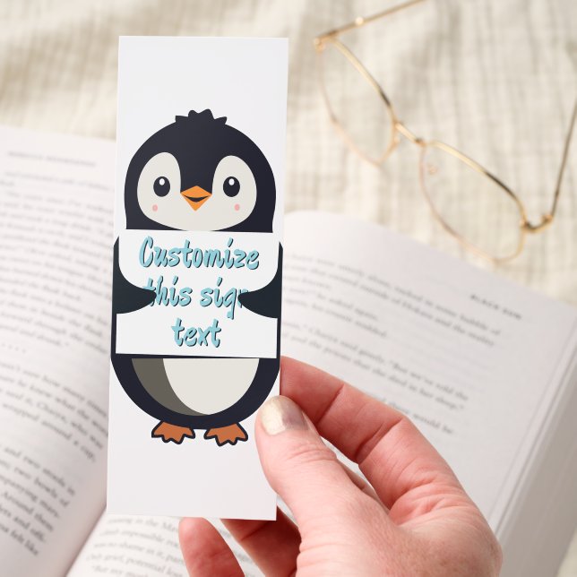 Cute penguin holding a sign for personalized text bookmarks (Hand)