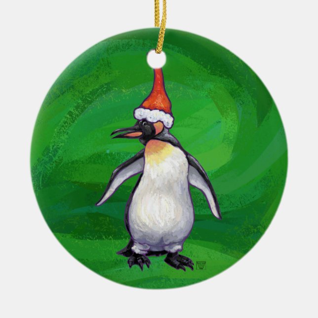 Cute Penguin in Santa Hat on Green Ceramic Ornament (Front)