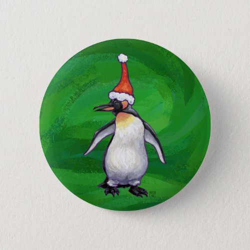 Cute Penguin in Santa Hat on Green Pinback Button