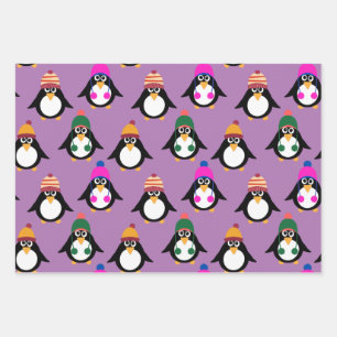 Cute penguins with winter hats wrapping paper sheets