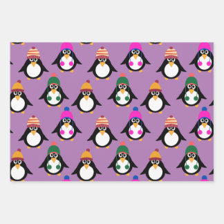 Cute penguins with winter hats wrapping paper sheets