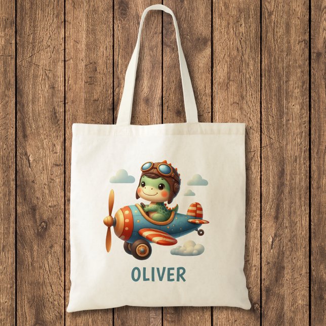Cute Pilot Trex Dinosaur Flying a Blue Airplane Tote Bag (Creator Uploaded)