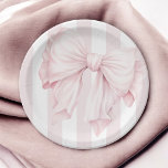 Cute Pink Coquette Bow Girl Baby Shower Paper Plates<br><div class="desc">A stylish paper plate for a girl baby shower, this feminine design has a pink coquette bow angled at the top the plate, adding a playful yet sophisticated flair. The background has a French awning stripe pattern in pastel pink and white. These plates are available in 2 sizes: shown here...</div>