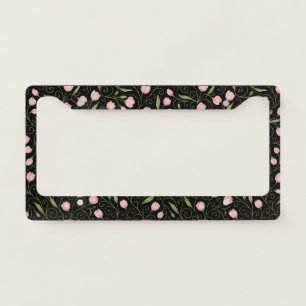 Cute, pink flower on black with repeating pattern license plate frame