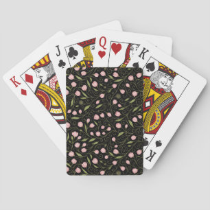 Cute, pink flower on black with repeating pattern poker cards