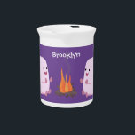 Cute pink marshmallows by camp fire cartoon beverage pitcher<br><div class="desc">These cute pink marshmallows are warming themselves by the camp fire. Drawn in fun cartoon illustration style.</div>