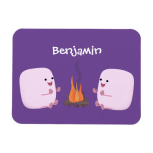 Cute pink marshmallows by camp fire cartoon magnet