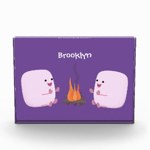 Cute pink marshmallows by camp fire cartoon photo block