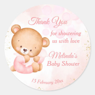 Cute pink teddy bear with a pillow baby shower classic round sticker