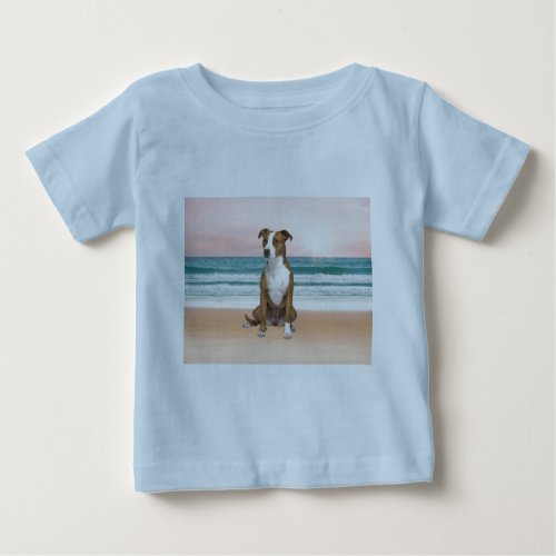 Cute Pitbull Dog Sitting on Beach with sunset Baby T_Shirt