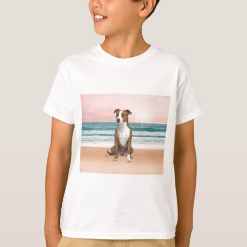 Cute Pitbull Dog Sitting on Beach with sunset T_Shirt