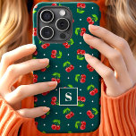 Cute Polka Dot Cherries On Teal Monogram iPhone 15 Case<br><div class="desc">This adorable design features bright red cherries and white polka dots against a sleek teal background, perfect for those who love a playful and bold style. The vivid cherries add a pop of color and charm, while the black backdrop creates a striking contrast. A personalized monogram adds a unique and...</div>