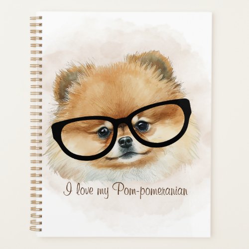 Cute  pomeranian dog with eye glasses planner