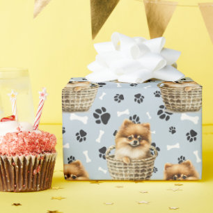 Cute Pomeranian Puppy in Basket Paw Print Wrapping Paper