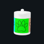 Cute Puppy Paws In Squares Teapot<br><div class="desc">A cute pattern of black dog paw prints in squares of different colors.
Original decorative design.</div>