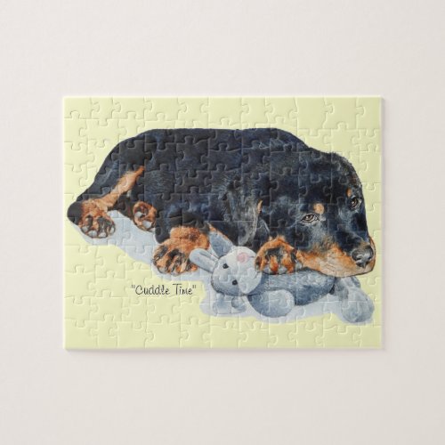 cute puppy rottweiler cuddling teddy bear jigsaw puzzle