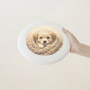 Cute puppy wrapped by knitted blanket Wham-O frisbee