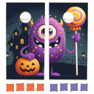 Cute, purple trick-or-treating monster cornhole set