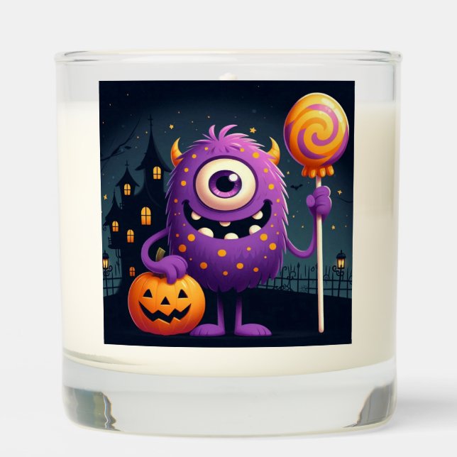 Cute, purple trick-or-treating monster scented candle (Front)
