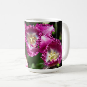 Cute purple tulips in the garden coffee mug