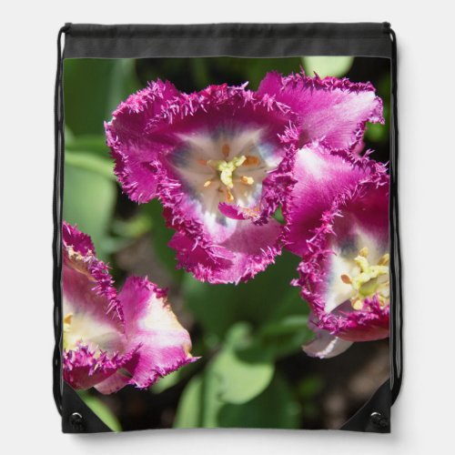 Cute purple  tulips  in the garden  drawstring bag