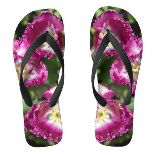 Cute purple tulips in the garden flip flops