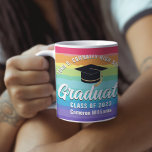 Cute Rainbow Graduate Custom LGBTQ Graduation Coffee Mug<br><div class="desc">This cute rainbow custom LGBT senior graduate mug features your high school or college name for the class of 2024. Customize with your graduating year under the chic handwritten script and black grad cap for a great personalized graduation gift for an LGBTQ friend who loves colorful presents.</div>