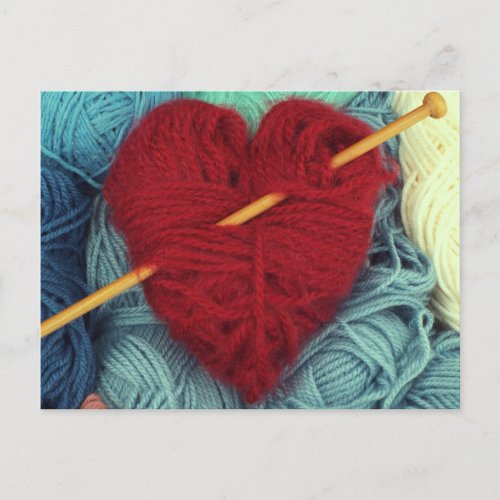 Cute red wool heart with knitting needle postcard