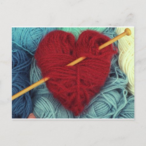 Cute red wool heart with knitting needle postcard
