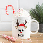 Cute Reindeer Boy Santa Hat Custom Name Christmas Coffee Mug<br><div class="desc">Cute Christmas coffee or hot cocoa mug features an illustration of a sweet Rudolph reindeer boy face with a shiny red nose, eyelashes, and antlers. He is dressed up with a red Santa Claus hat and surrounded by light gray snowflakes. Personalize this festive hot chocolate mug with a first name...</div>