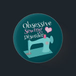 Cute Retro Sewing Machine Seamstress Button<br><div class="desc">A pretty button for a seamstress or tailor in alterations who has Obsessive Sewing Disorder. This cute design features a beautiful vintage teal sewing machine with a pink heart.</div>
