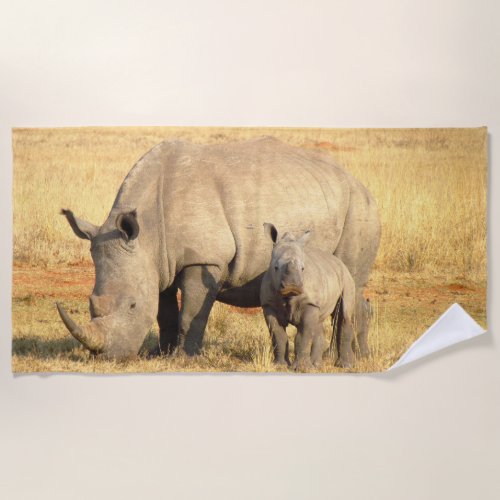 Cute rhinoceros in africa    beach towel