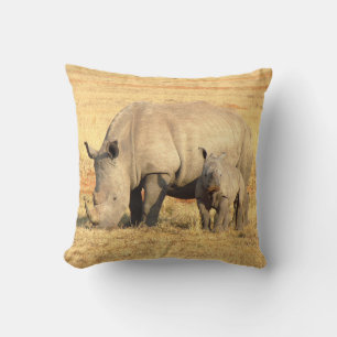 Cute rhinoceros in africa  throw pillow