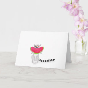 Cute ring-tailed lemur eating a watermelon card