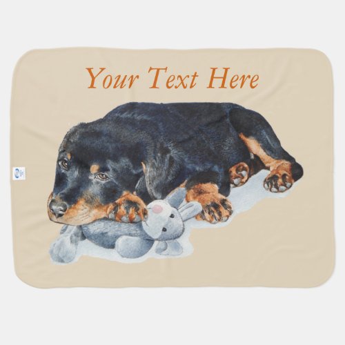 cute rottweiler puppy cuddling gray teddy bear dog baby blanket