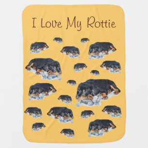 cute rottweiler puppy cuddling stuffie rotty dog baby blanket