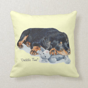cute rottweiler puppy dog cuddling teddy bear art throw pillow