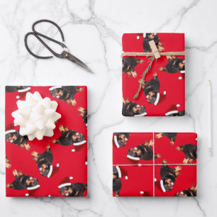 Cute Rottweiler Puppy Wearing Cartoon Santa Hat Wrapping Paper Sheets