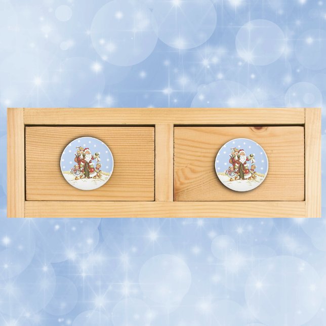 Cute Santa Folk Art Kids Christmas Snowflakes Ceramic Knob (Cute Santa Claus with Children lantern walking in snow on drawer knob pull.)