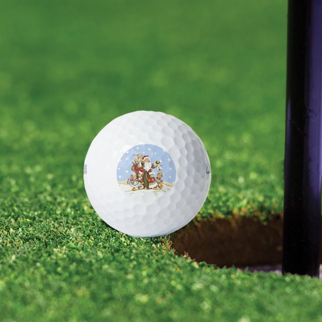 Cute Santa Folk Art Kids Christmas Snowflakes Golf Balls (Santa Clause walking in snow with little children carrying latern on golf balls.)