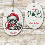 Cute Santa Hat Raccoon Christmas Ceramic Ornament<br><div class="desc">On the front of this cute kids' Christmas ornament is an adorable baby raccoon holding a candy cane. He wears a red and white Santa hat and scarf. A few silver snowflakes are scattered about, and your custom name is at the bottom. The back of the ornament has a Merry...</div>