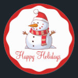 Cute Santa Snowman Happy Holiday Kids Christmas Classic Round Sticker<br><div class="desc">A whimsical snowman is wearing his Santa Claus hat, and a red and gold striped scarf. He has a carrot nose, a big smile and stick hands. Happy Holidays is the wording in a festive red script font below, on a white background. A circle scallop border in a matching Christmas...</div>