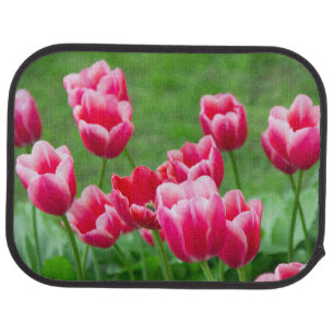 Cute scarlet tulips in the garden car floor mat
