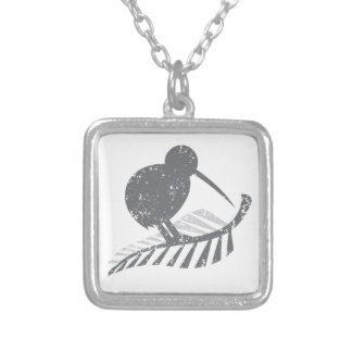 cute silver kiwi bird and silver fern distressed plated necklace