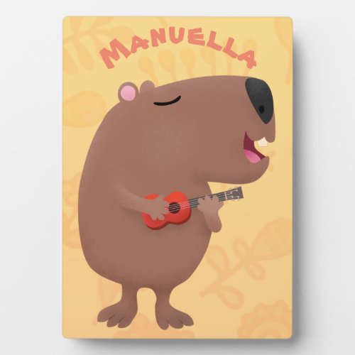 Cute singing capybara ukulele cartoon illustration plaque