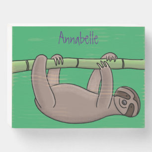 Cute smiling sloth on bamboo cartoon illustration wooden box sign