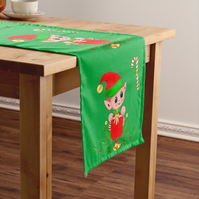 Cute snowman and golden ball on green medium table runner (In Situ)